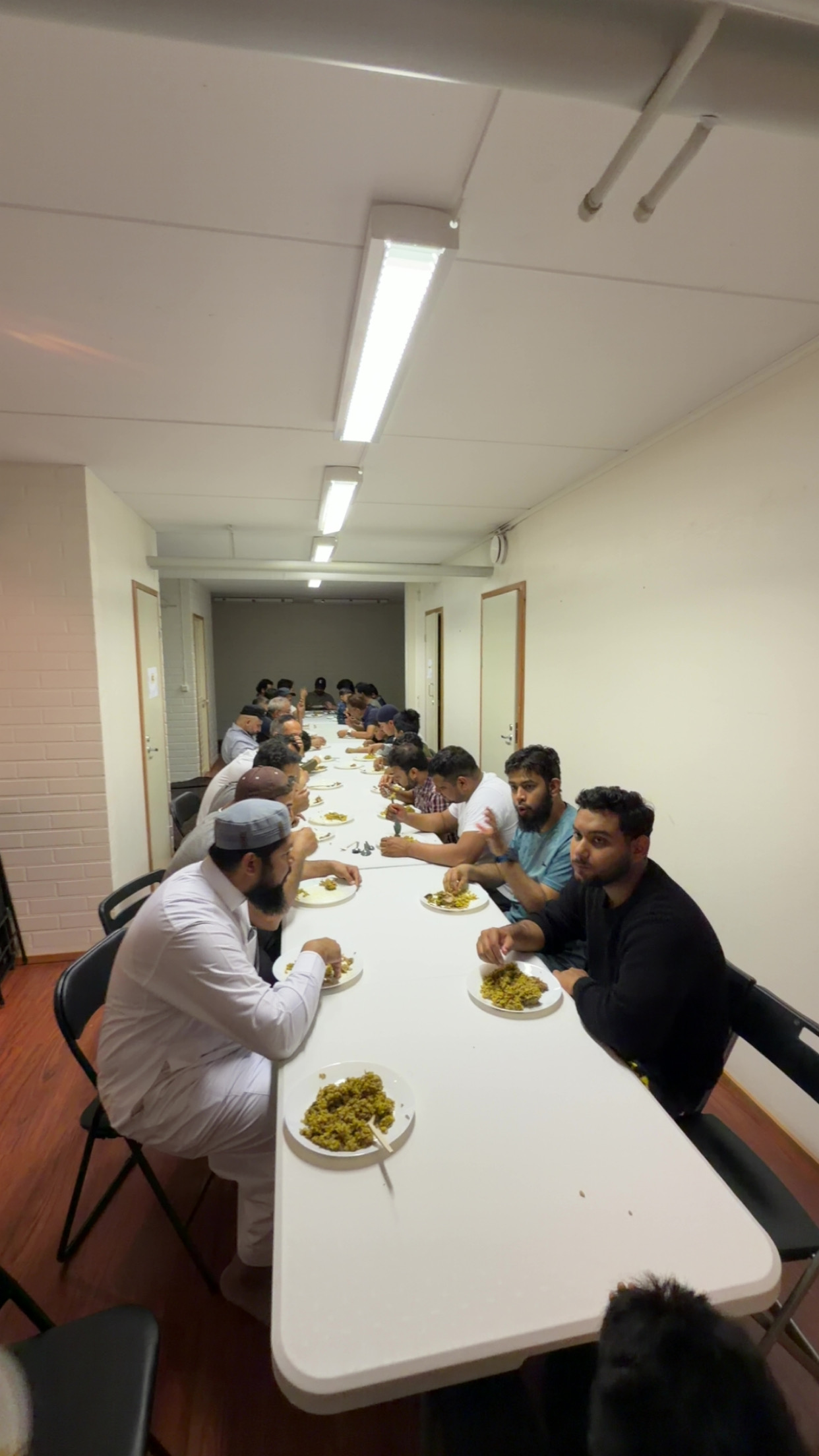 Image 27 of 31 from an EMC gathering, celebration, or shared community meal
